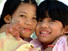 Smiling girls at Shwedagon Paya,  Yangon